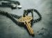 key on a chain with the words "Faith" imprinted