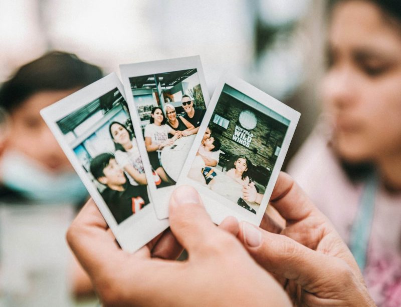 Looking at pictures | Photo by Tim Mossholder on Unsplash