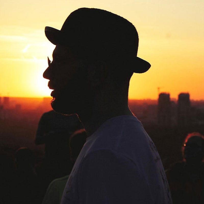 Man and sunrise | Photo by Eugene Chystiakov on Unsplash