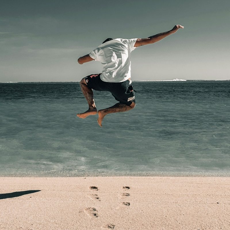 Man jumping | Photo by Nicolas I. on Unsplash