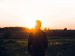 Man looking at the sunset | Photo by Warren on Unsplash