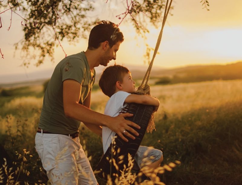 Man pushes his son