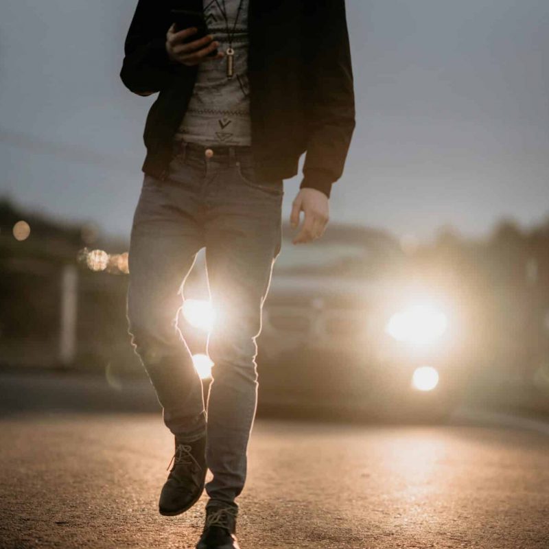 Man walking on a road
