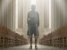 man standing in cathedral surrounded by light.