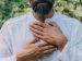 man putting his hands over his heart in gesture of gratefulness and thankfulness