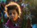 A young Venezuelan migrant carries a statue of Our Lady of Guadalupe as she walks with her family in caravan in an attempt to reach the U.S. border, in Tapachula, Mexico, Nov. 5, 2024. (OSV News photo/Daniel Becerril, Reuters)