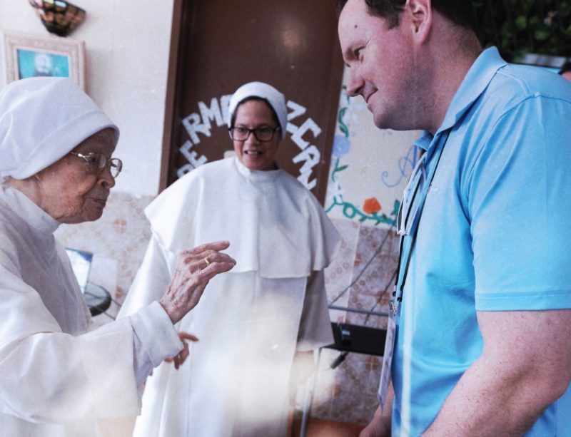 Man talks to a nun