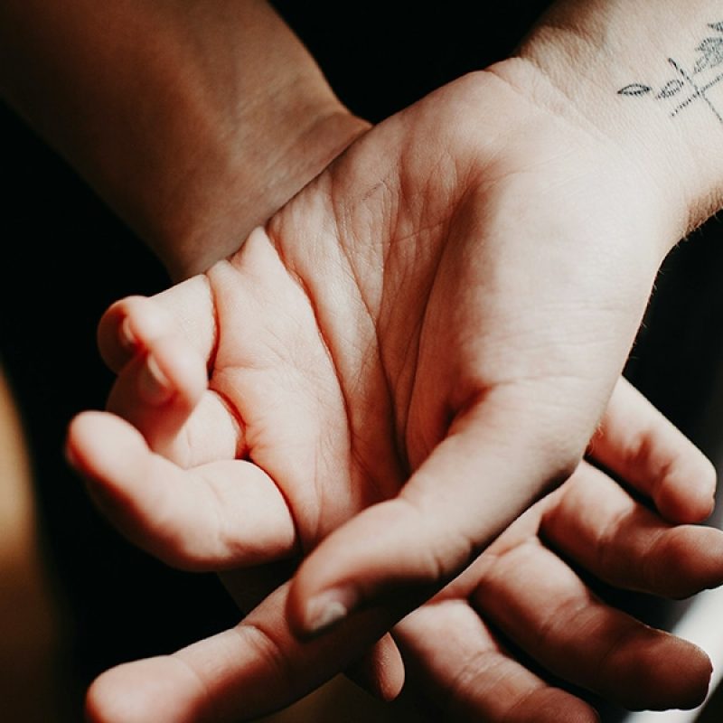 hands open | Photo by Thérèse Westby on Unsplash