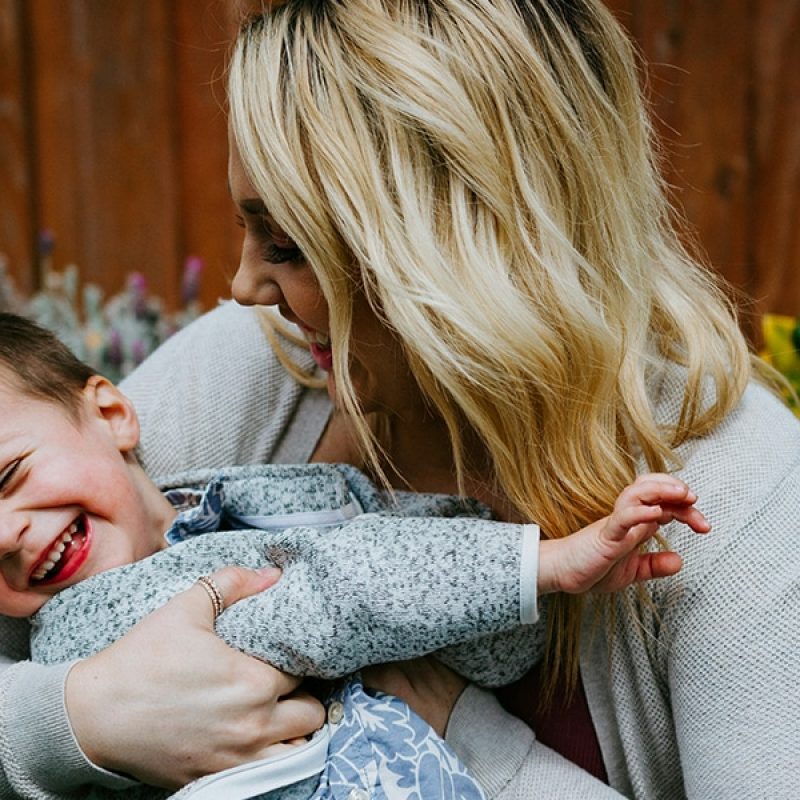 A mom enjoying time with her child.