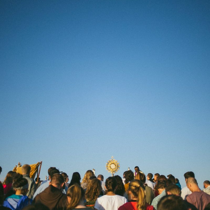 people attend mass outside