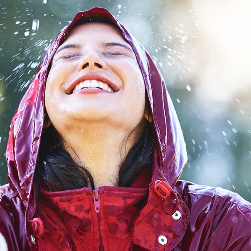 person getting wet in the rain