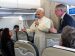 Pope Leo XIV answers a question from a journalist during a news conference aboard his flight from Turkey to Lebanon Nov. 30, 2025.