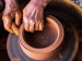 Potter making pottery