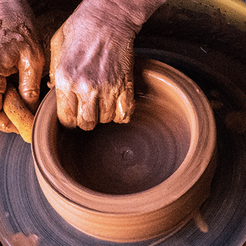 Potter making pottery