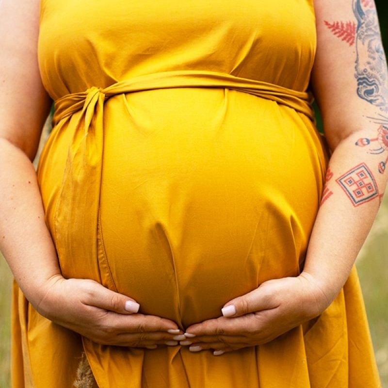 Pregnant woman with her baby belly