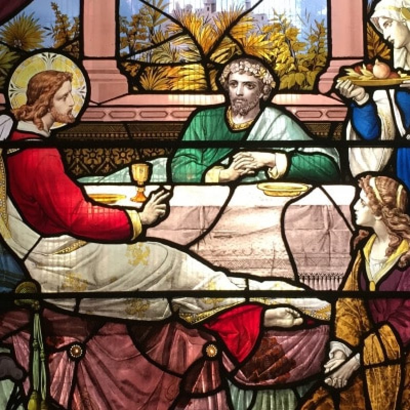 Stained glass window of Saints Martha, Mary, and Lazarus