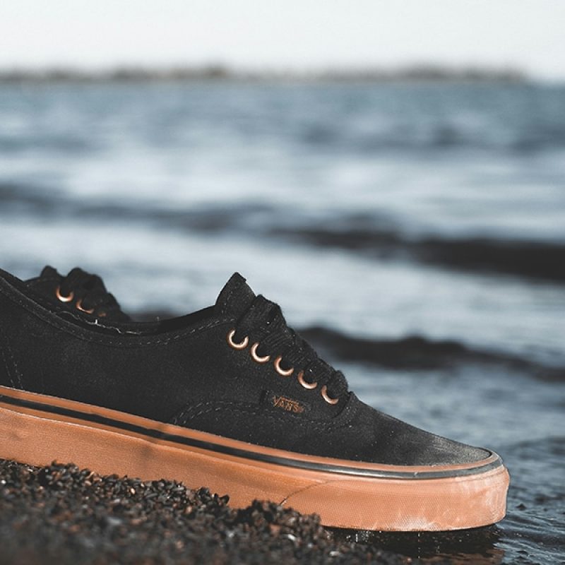 shoes left behind on a beach.