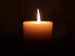 single-candle-dark-background