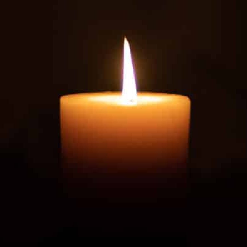 single-candle-dark-background