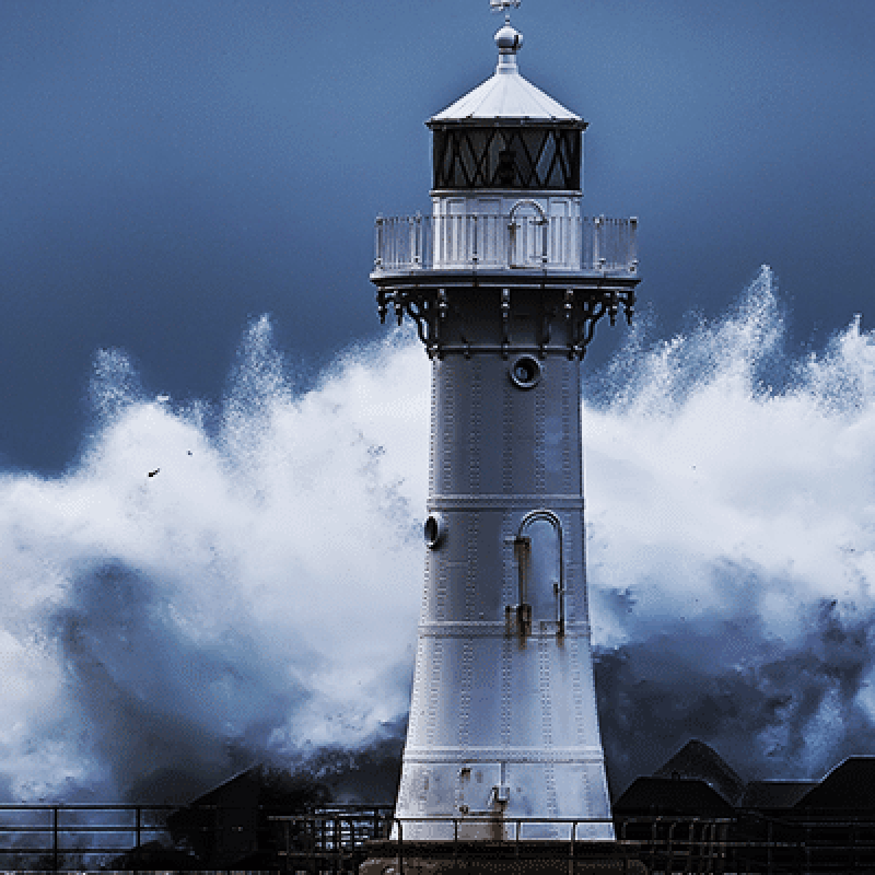 storm Lighthouse surrounded by waves