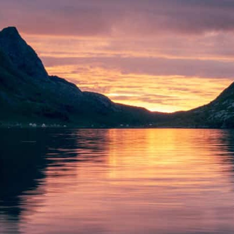 Sun setting over the water