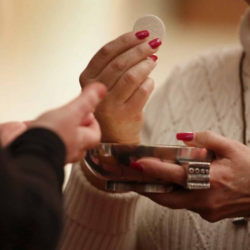 Distributing Holy Communion