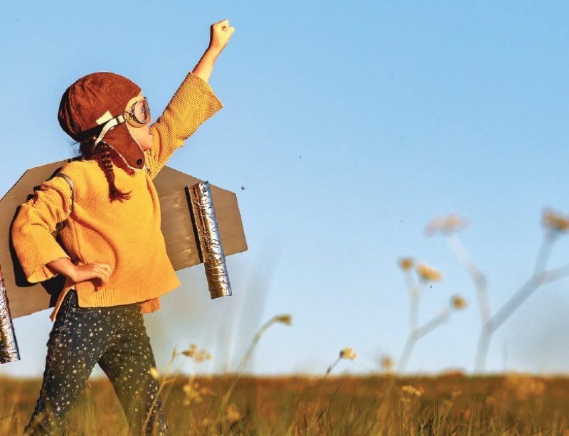 young kid in a field