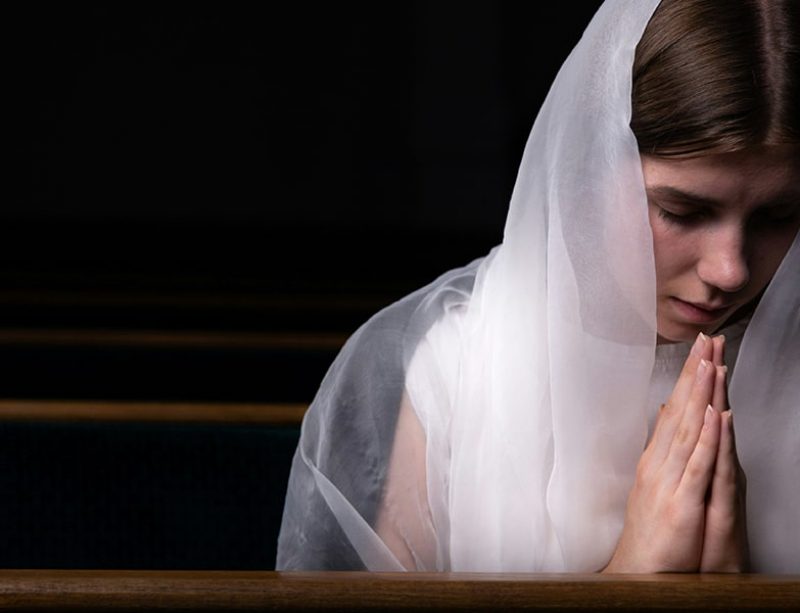young woman praying